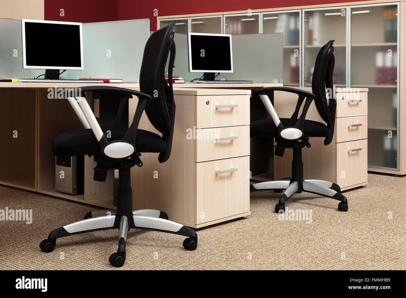 Computer Behind View computers behind the glass in a modern office Stock Photo - Alamy