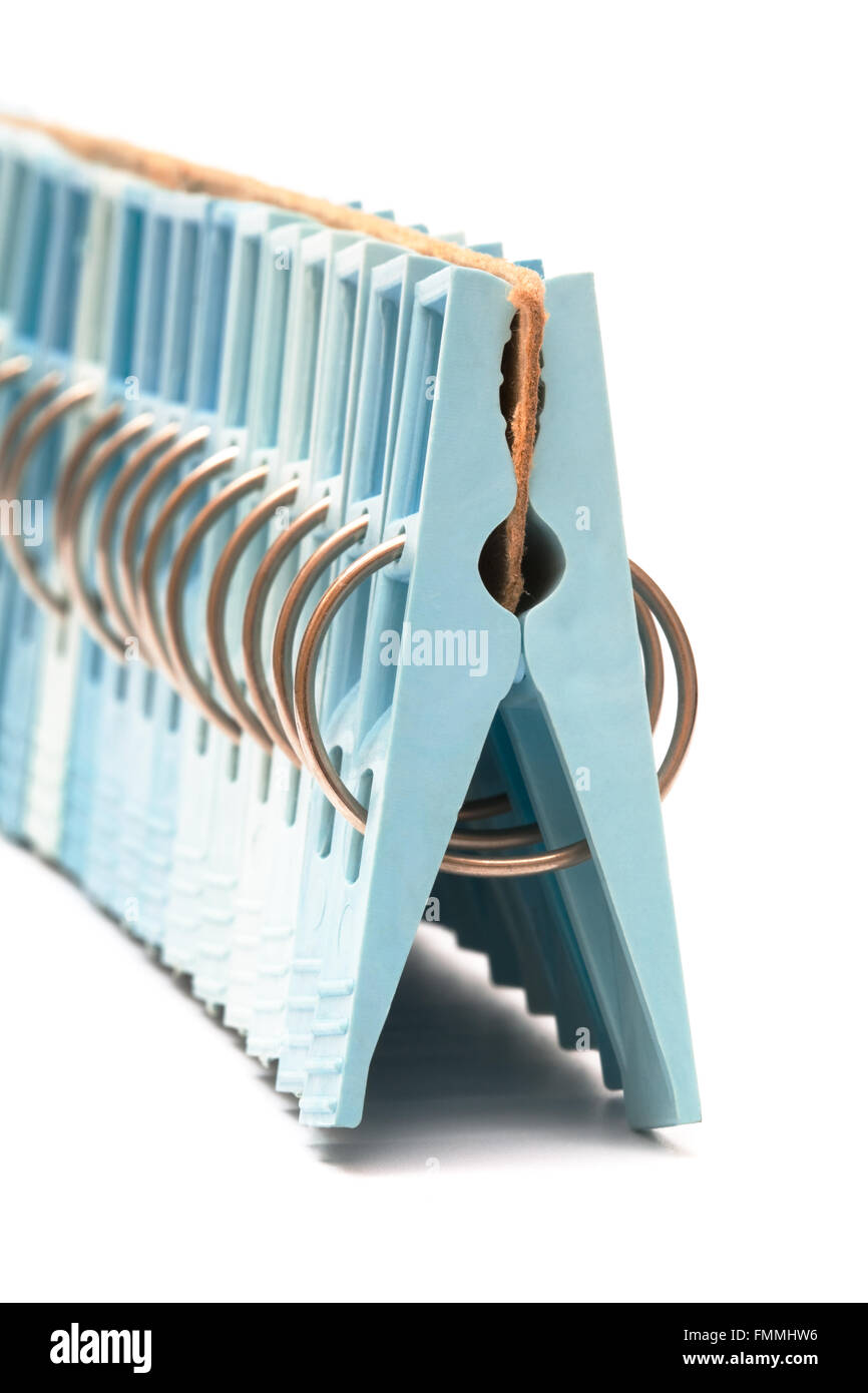 set of blue clothespin on a white background Stock Photo