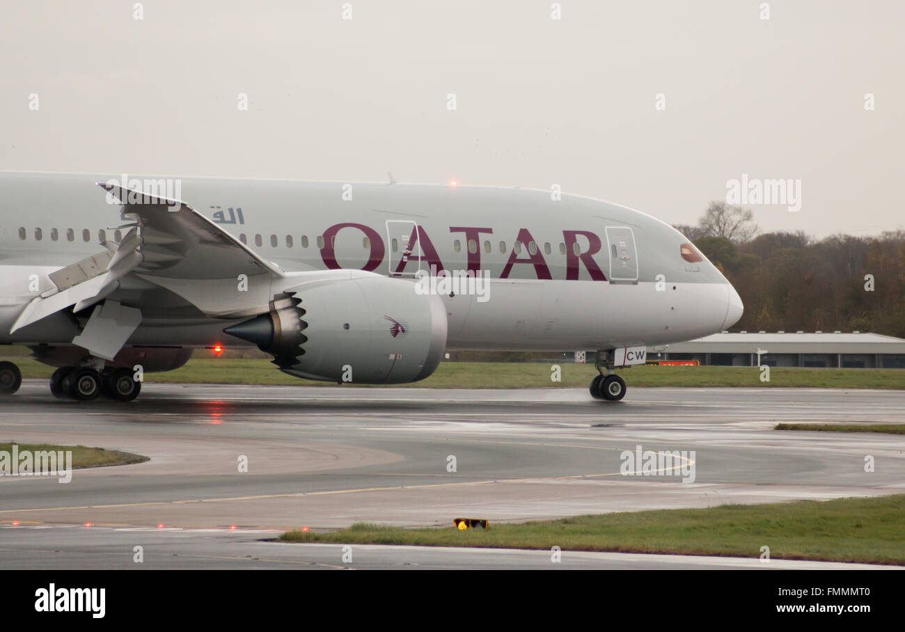 Qatar Airways Boeing 787-8 Dreamliner wide-body passnenger plane (A7-BCW) arrives to Manchester International Airport runway. Stock Photo