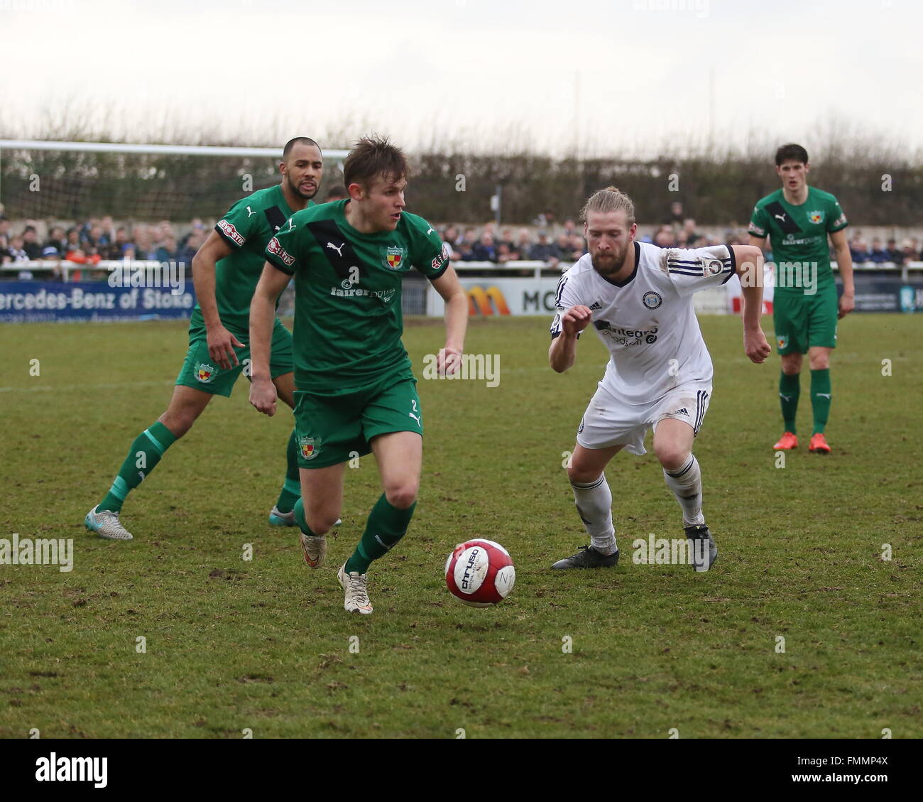 Nantwich, Cheshire. UK. 12th March, 2016. Nantwich Town lost 4-2 at home to FC Halifax Town in front of a crowd of 2078 in the FA Trophy Semi-Final 1st leg. Andy White of Nantwich Town advances with the ball. Credit:  Simon Newbury/Alamy Live News Stock Photo