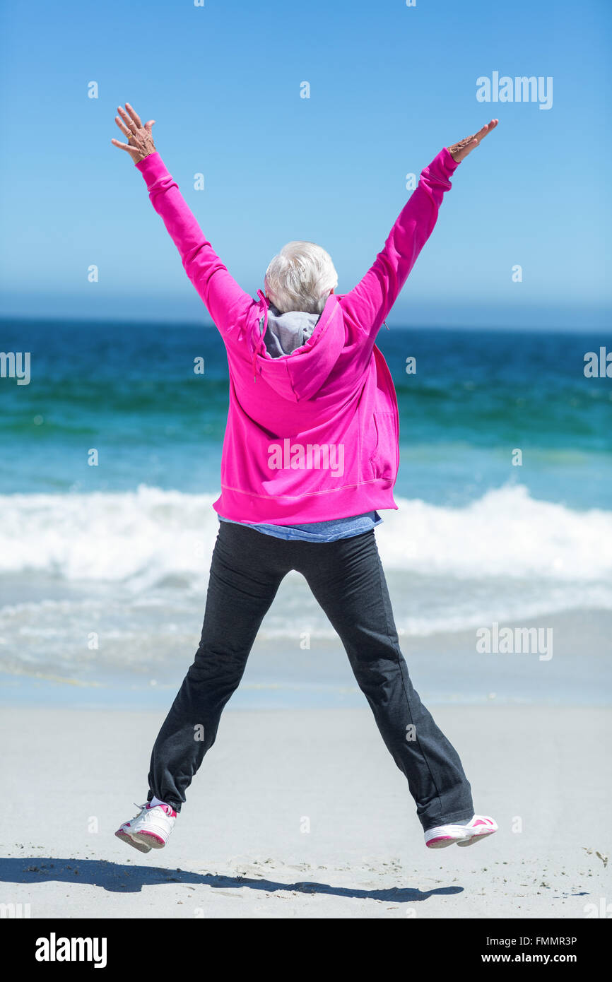 Mature woman beach arms hi-res stock photography and images - Alamy