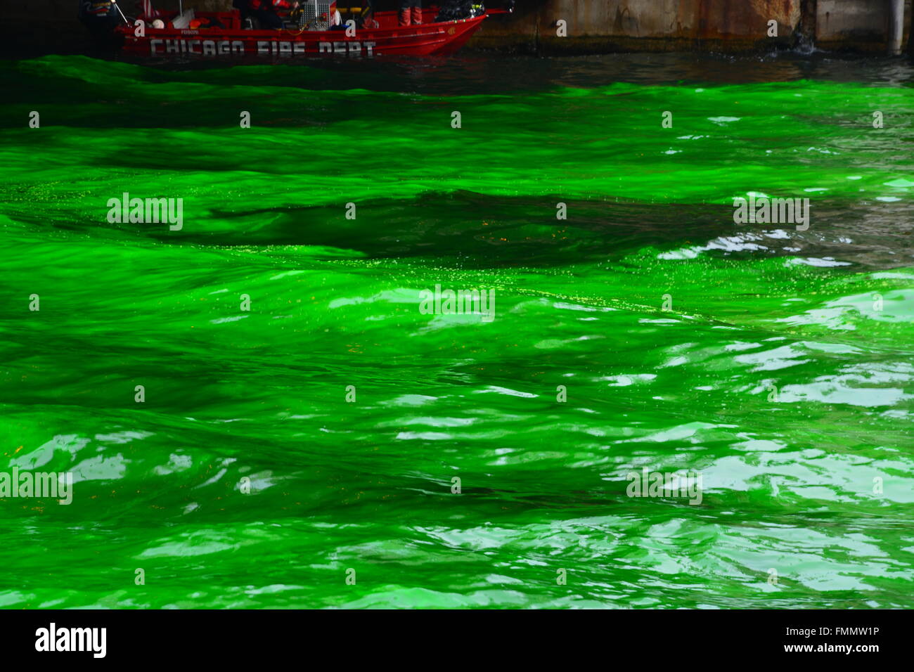 The Chicago Fire Dept divers are near during the annual dying the Chicago River green for St. Patrick's Day, 3/12/2016 Stock Photo