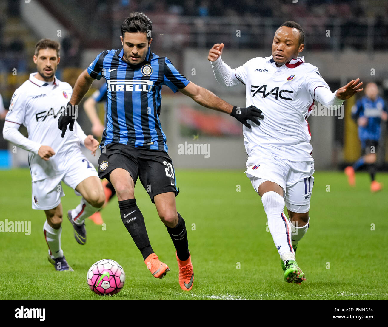 Milan, Italy. 12th mar, 2016: Citadin Eder (center) and Juan Camilo Zuniga competes for the ball during the Serie A football match between FC Internzionale and Bologna FC at Giuseppe Meazza Stadium in Milan, Italy. Credit:  Nicolò Campo/Alamy Live News Stock Photo