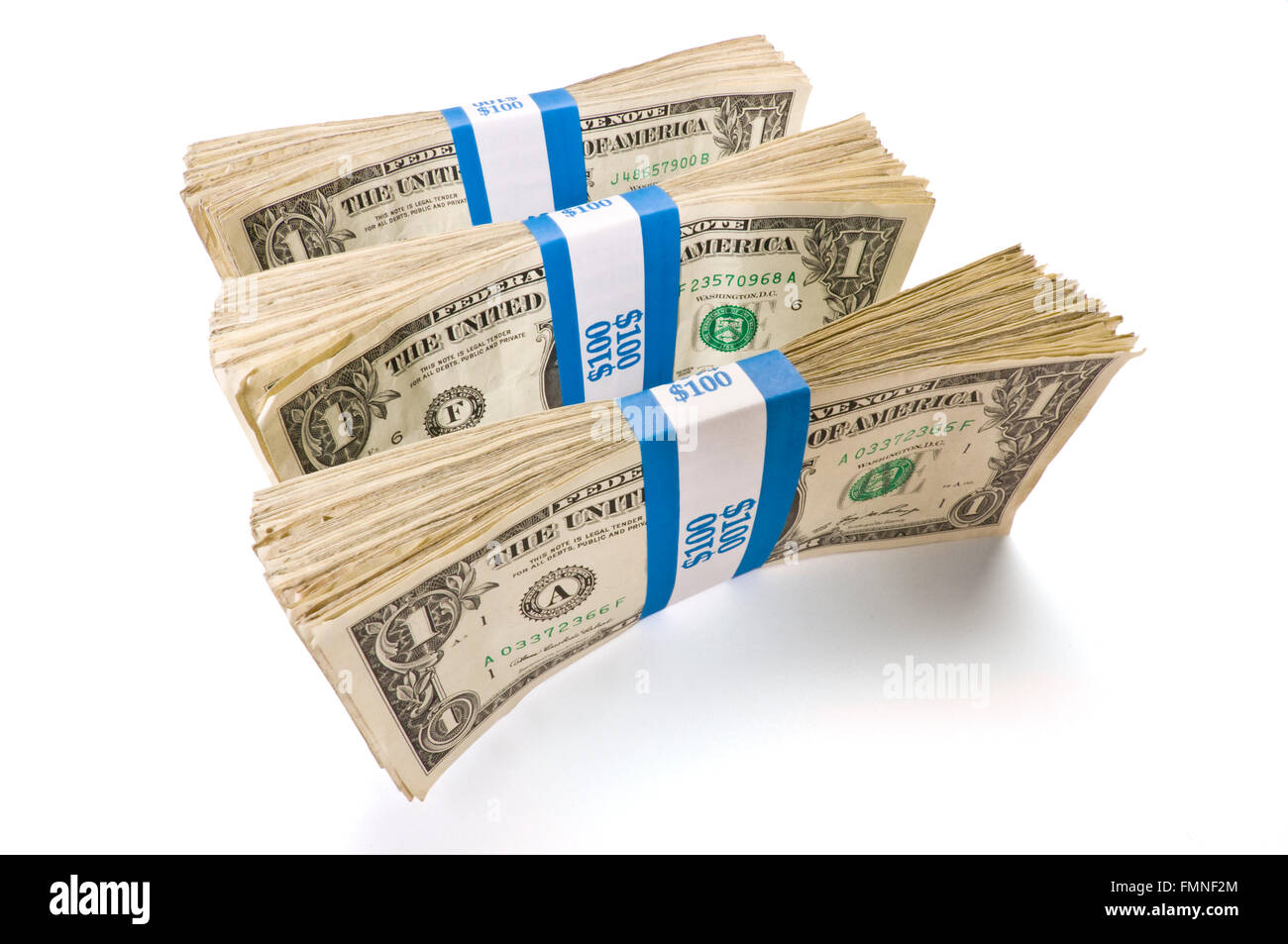 Three Bundles of Dollar Bills Stock Photo
