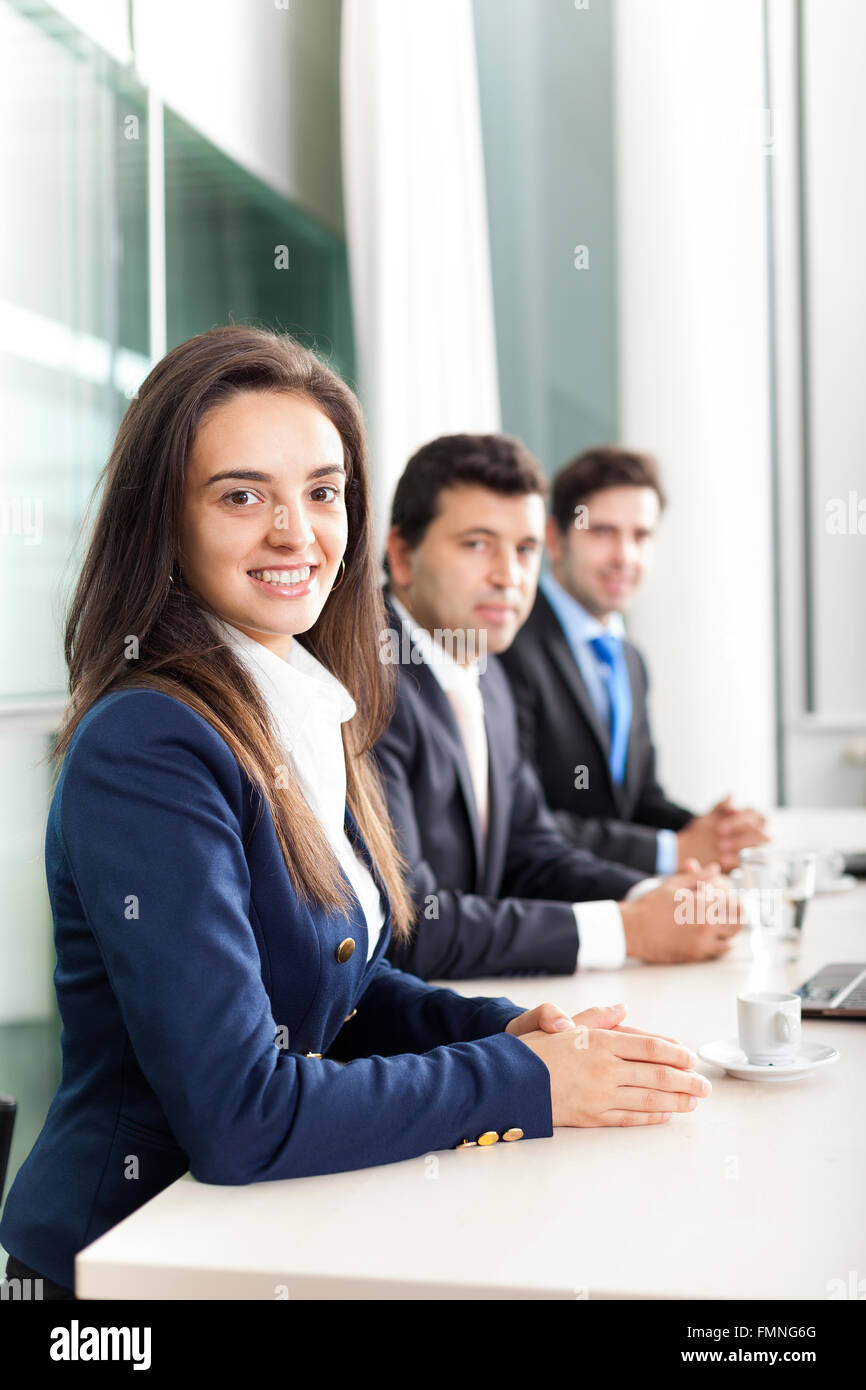 Business team smiling at the office, lined up Stock Photo - Alamy