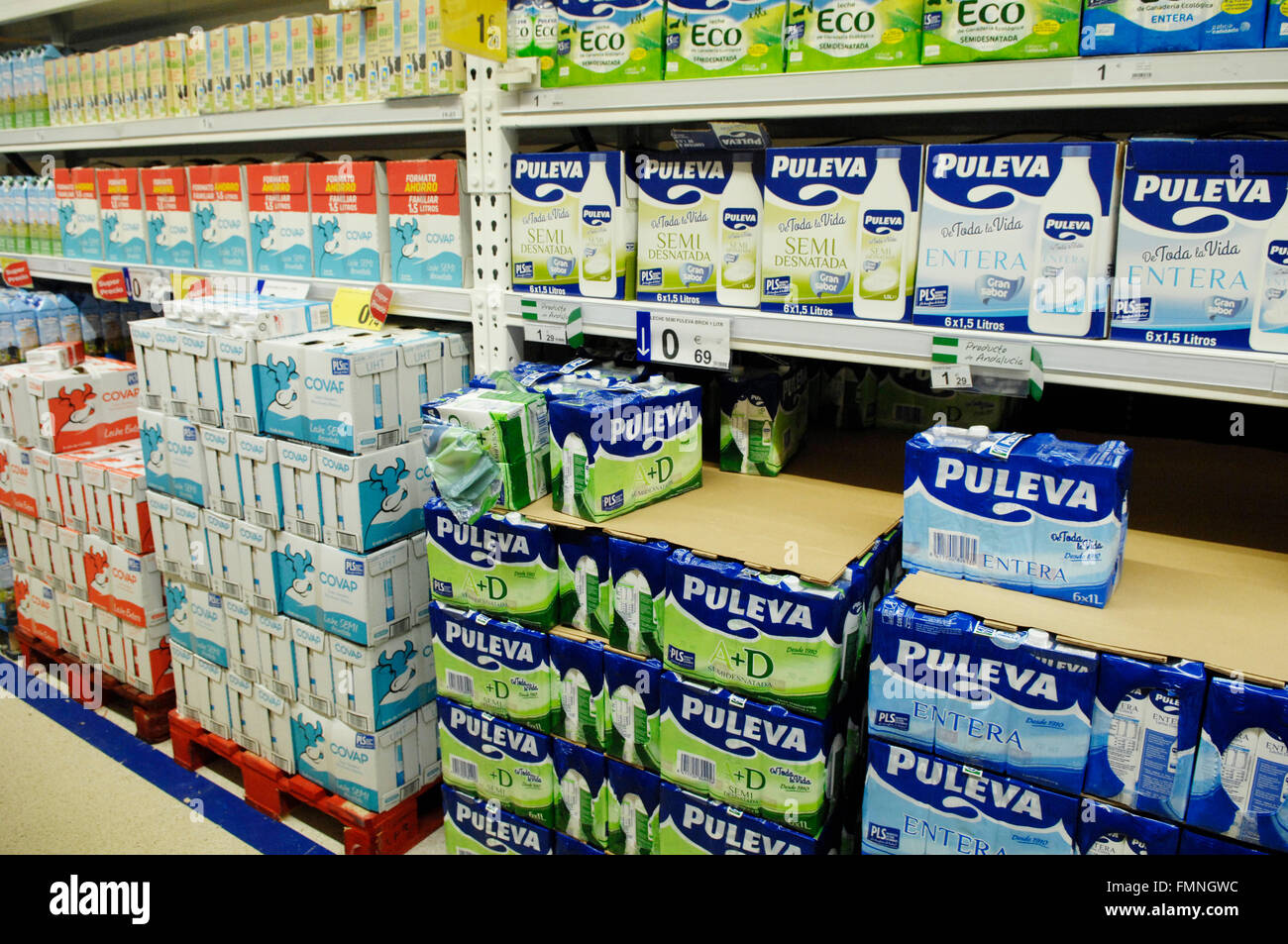 Milk cartons on display in supermarket in Malaga, Spain Stock Photo