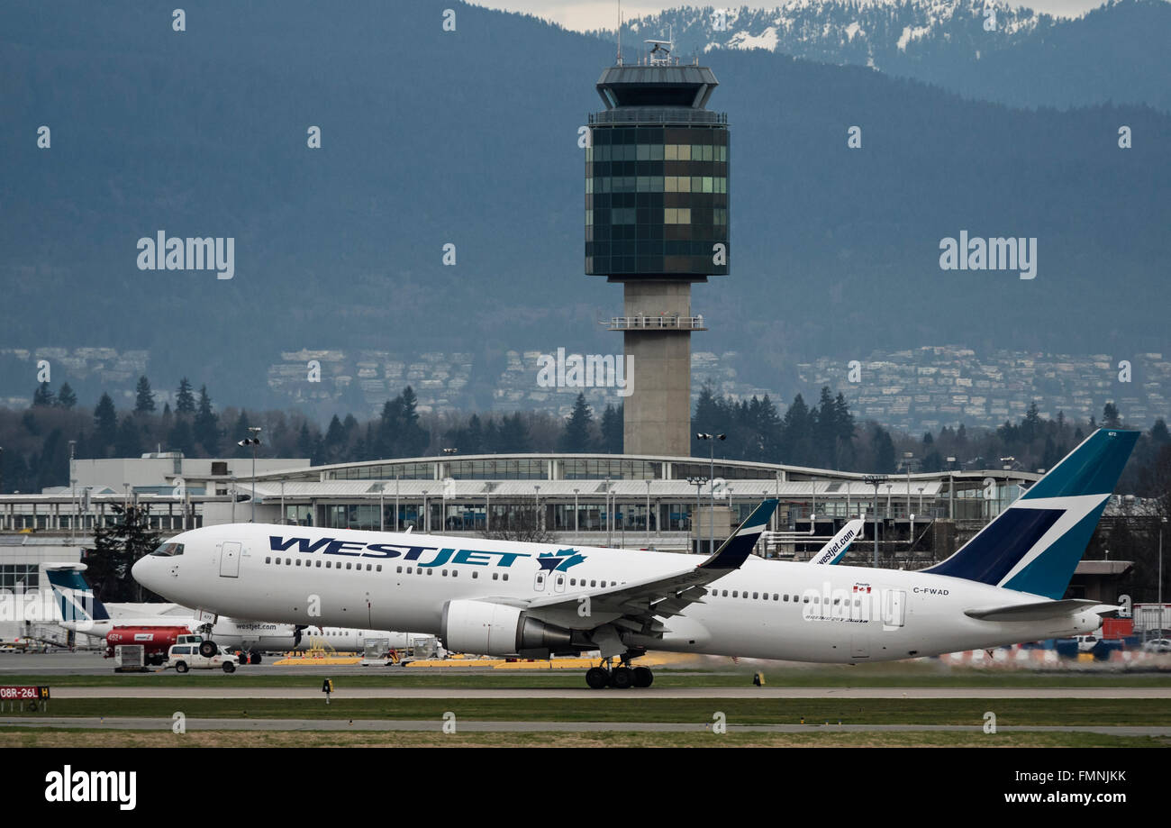WestJet Airlines Boeing 767-300ER C-FWAD take taking off departing Vancouver International Airport Canada Stock Photo