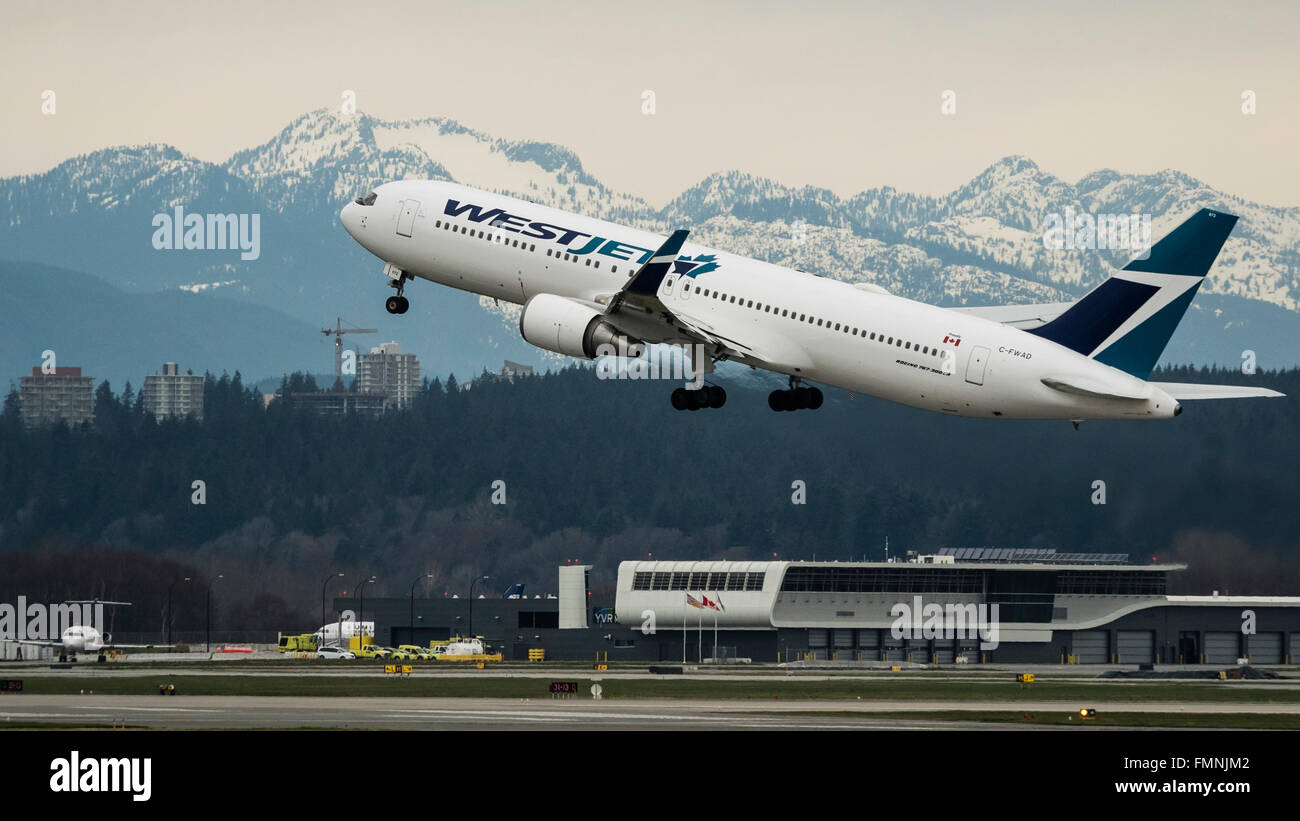 WestJet Airlines Boeing 767-300ER C-FWAD take taking off airborne departing Vancouver International Airport Canada Stock Photo