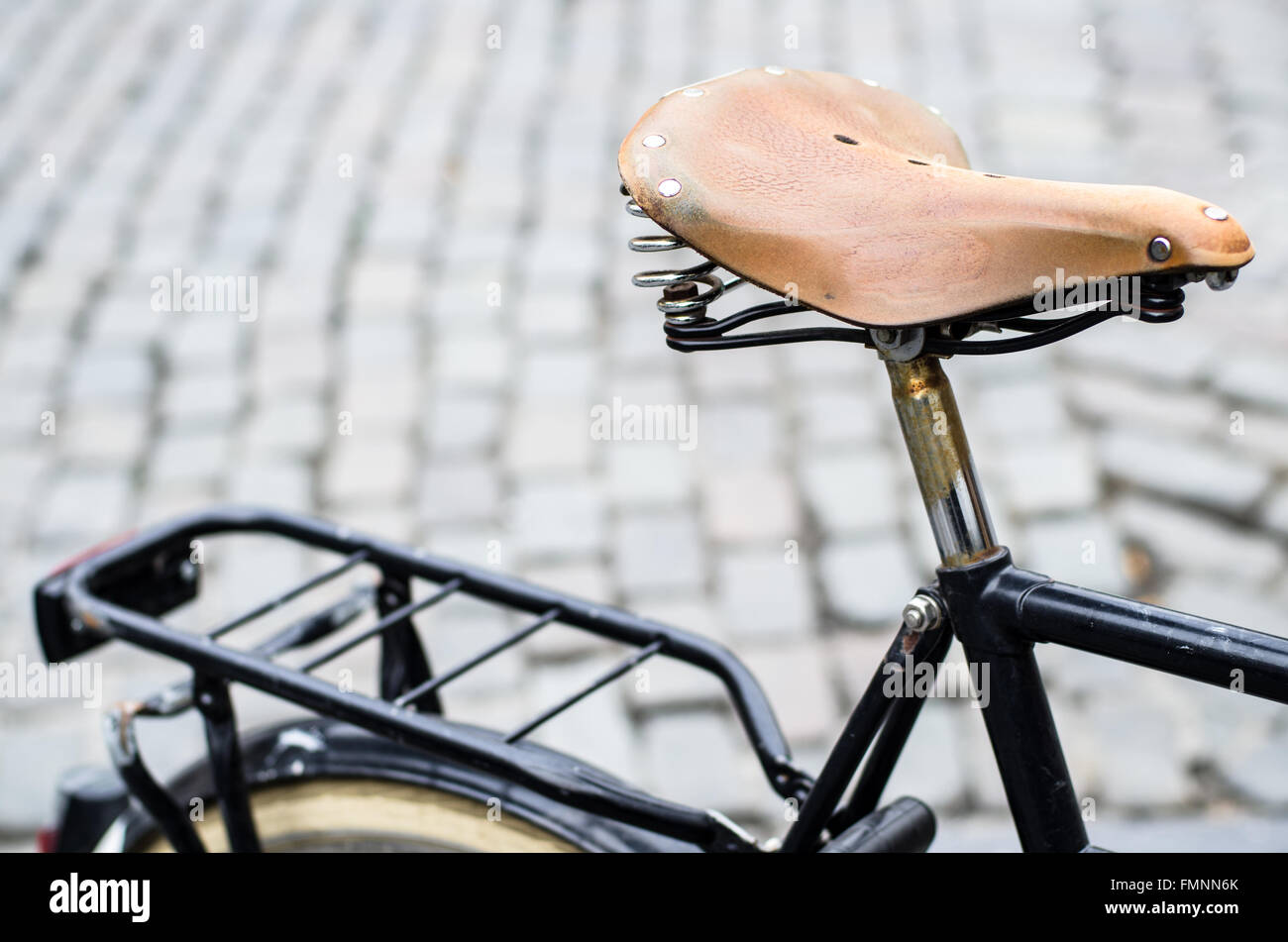 detail of old cool vintage bike in the streets of Amsterdam Stock Photo