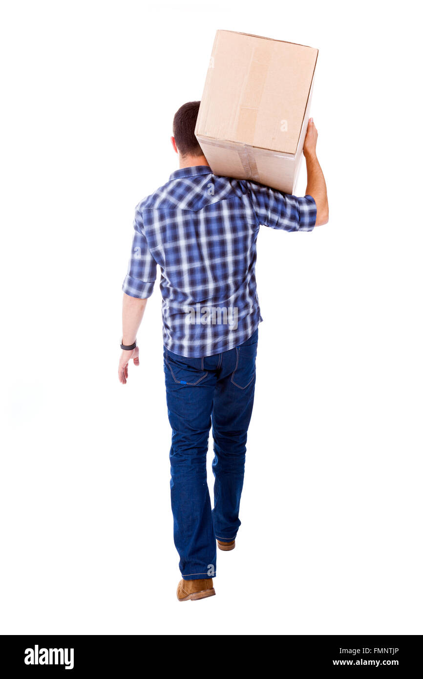 Young man carring a cardboard box, isolated on white background Stock Photo