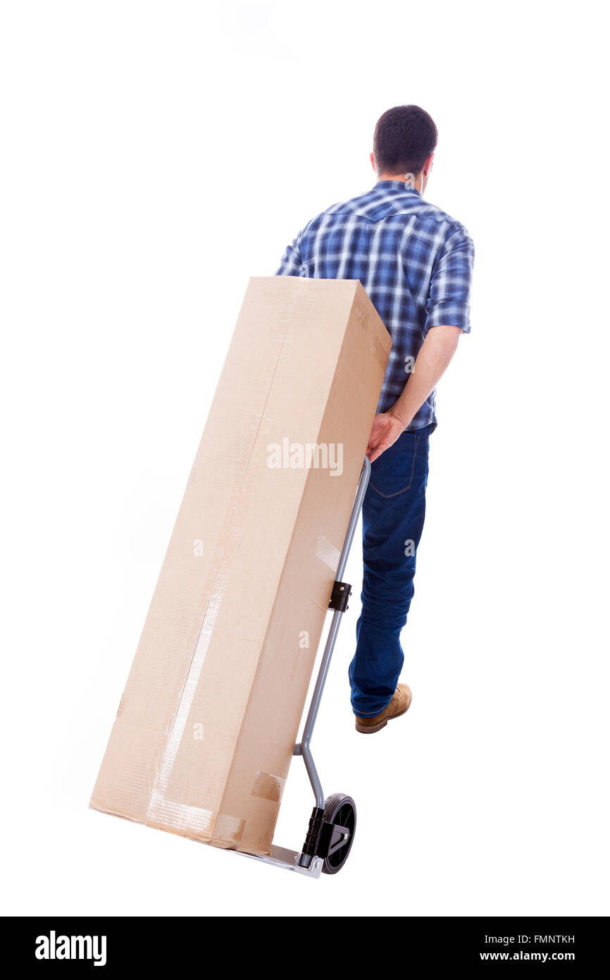 Young man carring a cardboard box, isolated on white background Stock Photo
