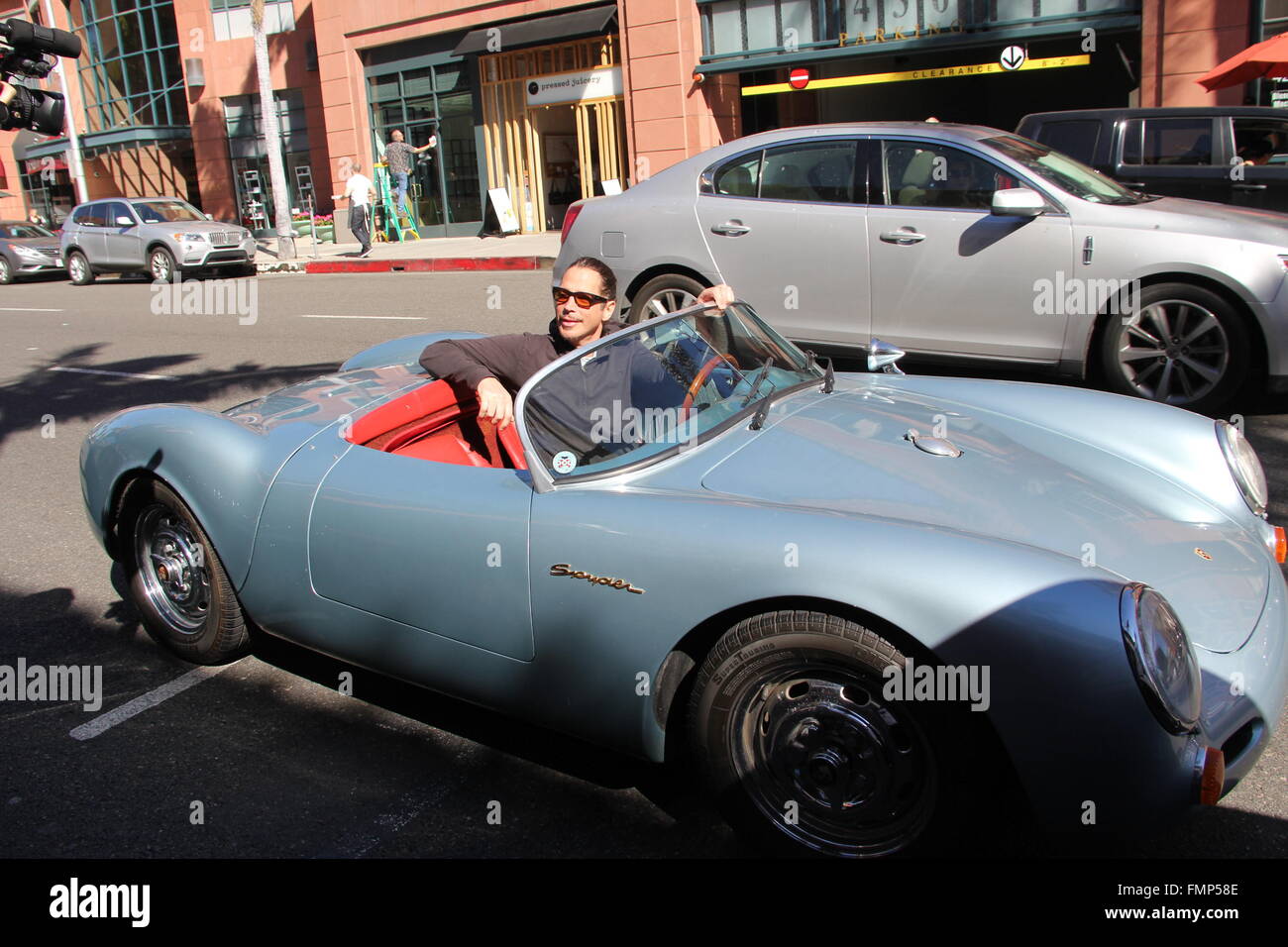 Chris Cornell jumps into his vintage 1955 Porsche Speedster Spyder, the same model James Dean drove  Featuring: Chris Cornell Where: Beverly Hills, California, United States When: 10 Feb 2016 Stock Photo