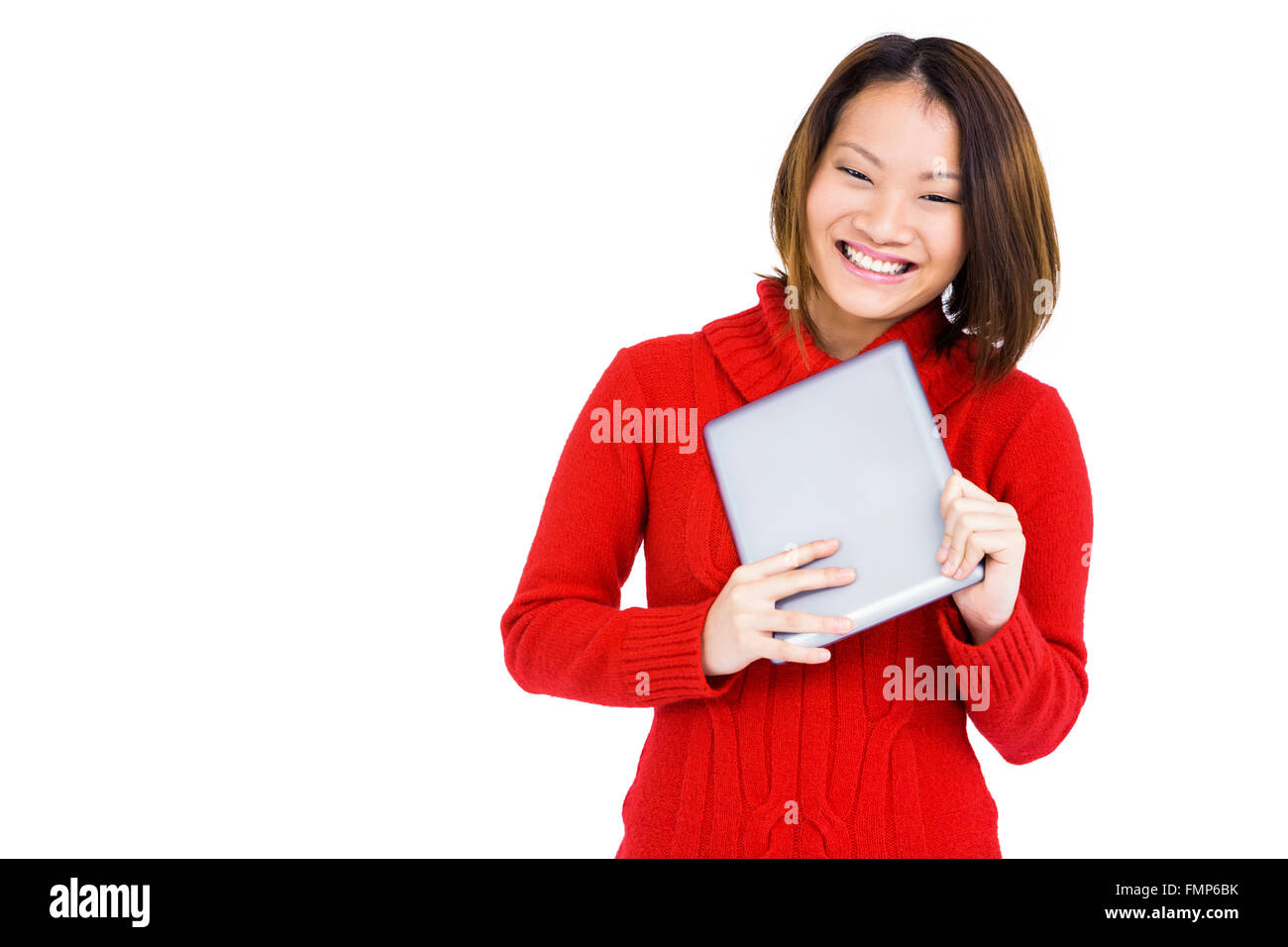 Young woman holding digital tablet Stock Photo - Alamy