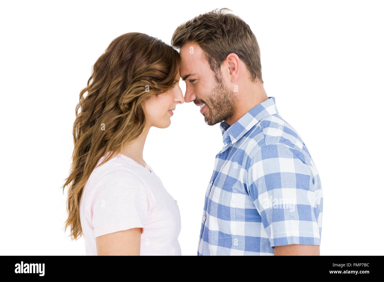 Happy young couple rubbing nose Stock Photo Alamy