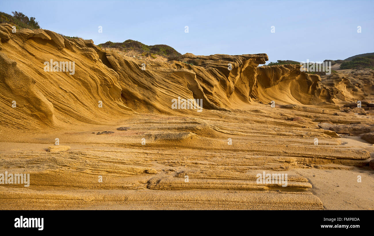 Washed out rock, rock formations on the beach of Portu Maga, Costa Verde, Sardinia, Italy Stock Photo
