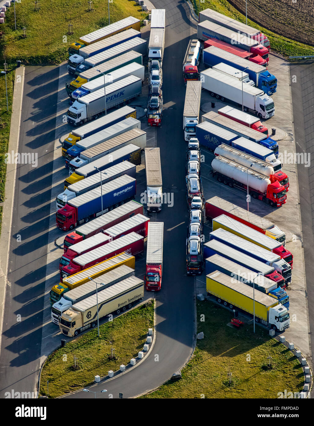 Aerial view, Aachener Land motorway service area with full parking lot, trucks parking, herringbone, Eschweiler, Rhineland Stock Photo