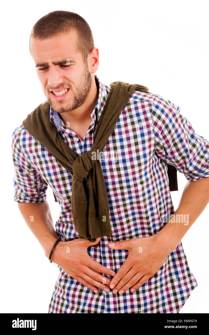 Young man with strong stomach pain isolated on white background Stock