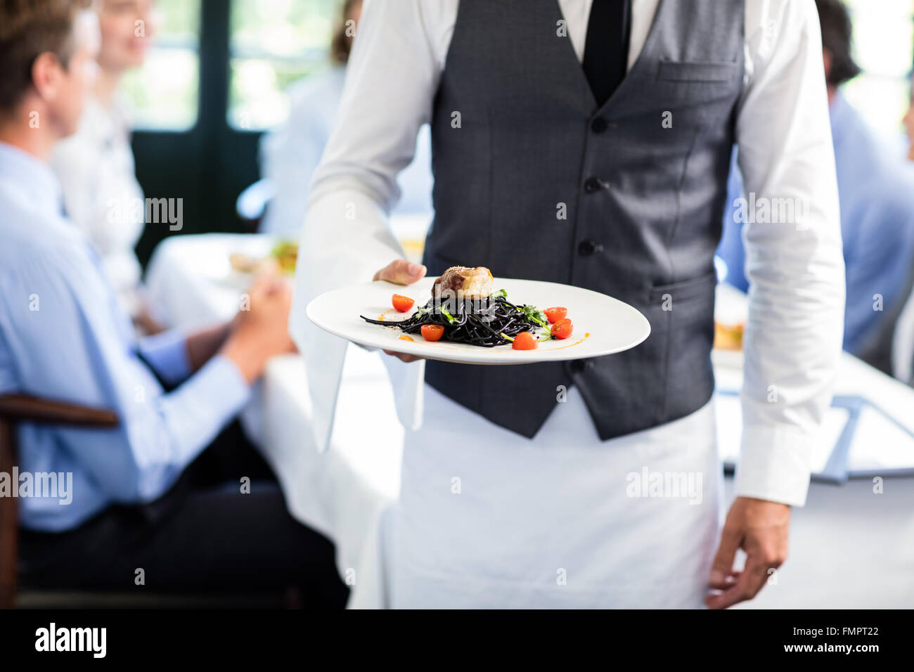 Black waiter uniform hi-res stock photography and images - Alamy