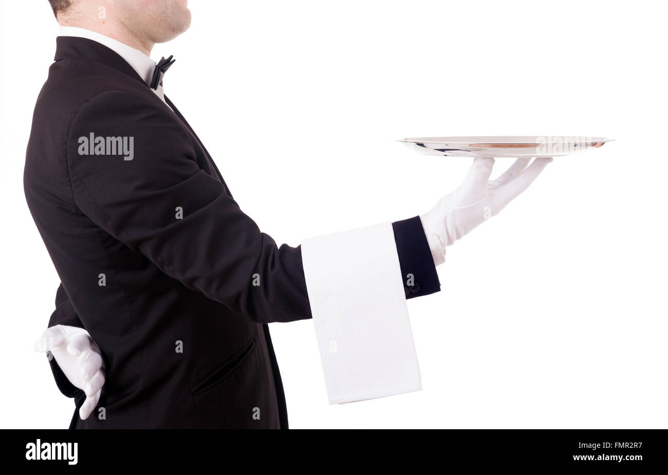 Cropped image of a young waiter holding an empty dish on white background Stock Photo