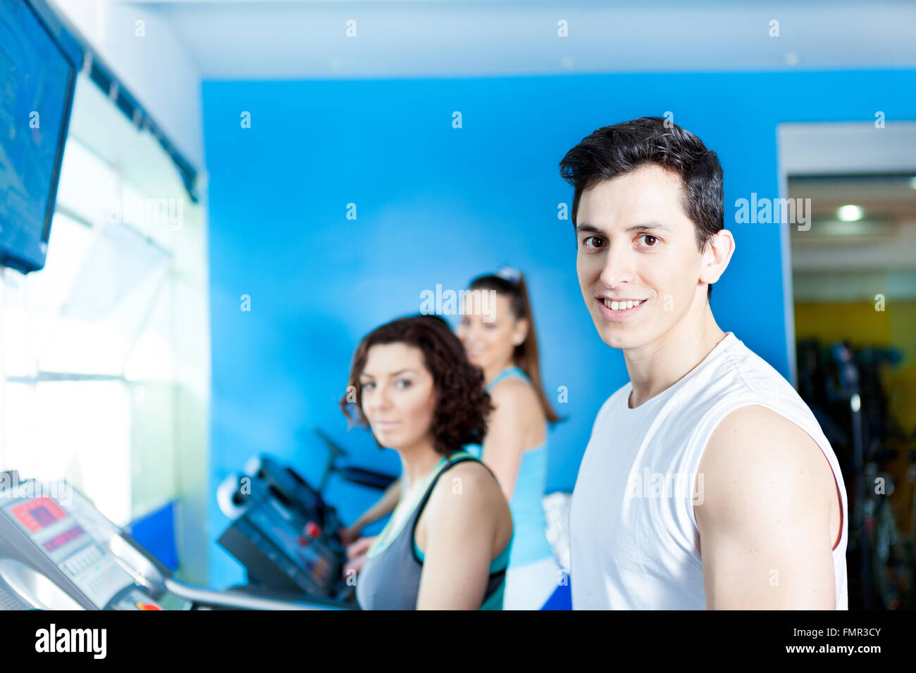 Group of people in the gym doing cardio training Stock Photo