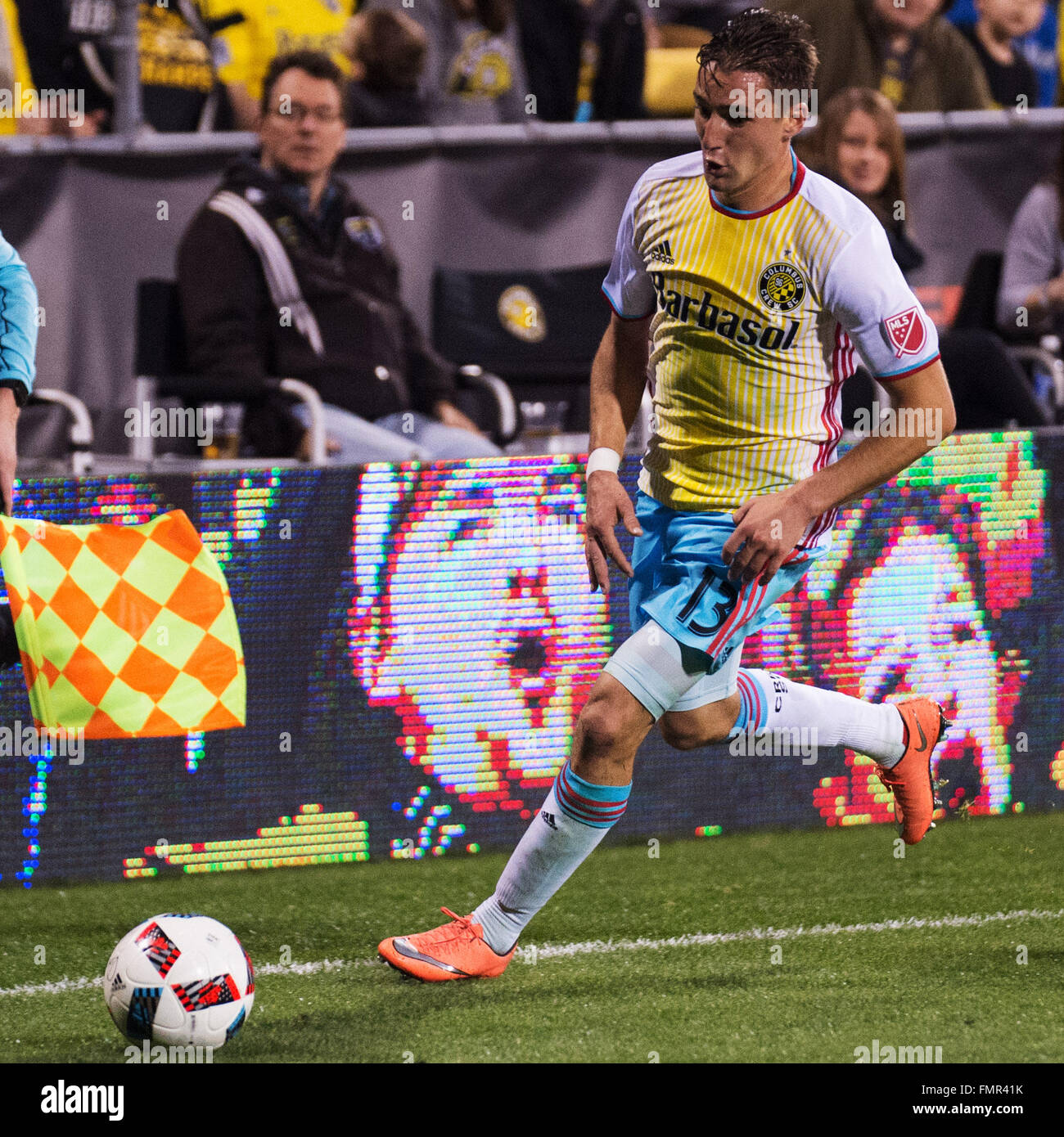 Columbus, Ohio, USA. 12th March, 2016. Columbus Crew midfielder Ethan Finlay (13) handles the ball in the match against Philedadelphia at Mapfre Stadium. Columbus, Ohio, USA. Credit:  Brent Clark/Alamy Live News Stock Photo