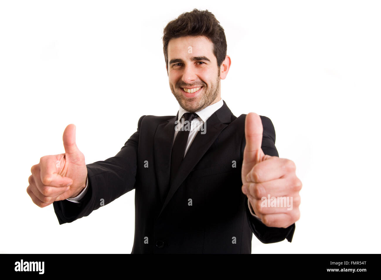 Successful young business man thumbs up, isolated on white Stock Photo