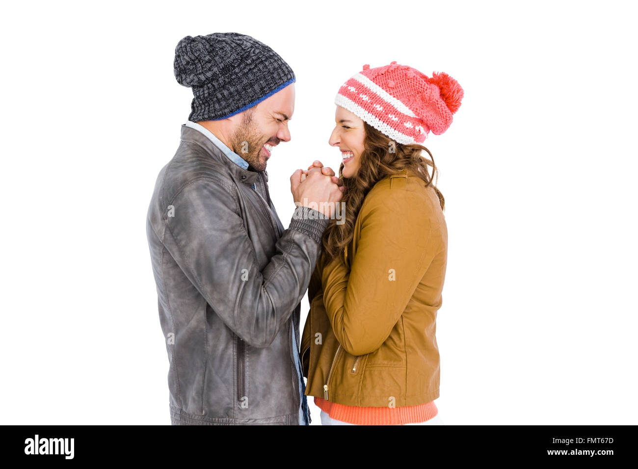 Young couple in warm cloth standing face to face and shivering Stock