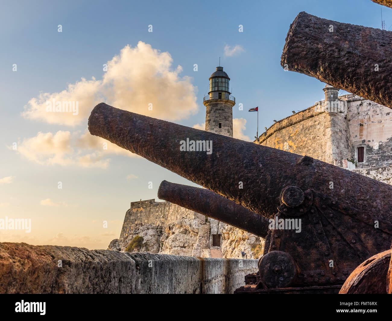 A battery of old rusted Spanish era canons point out to Havana Harbor