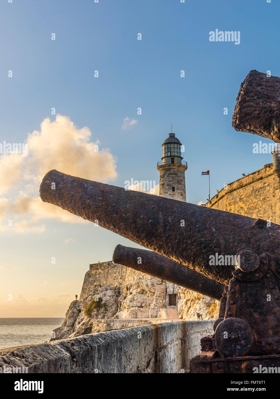 A battery of old rusted Spanish era canons point out to Havana Harbor
