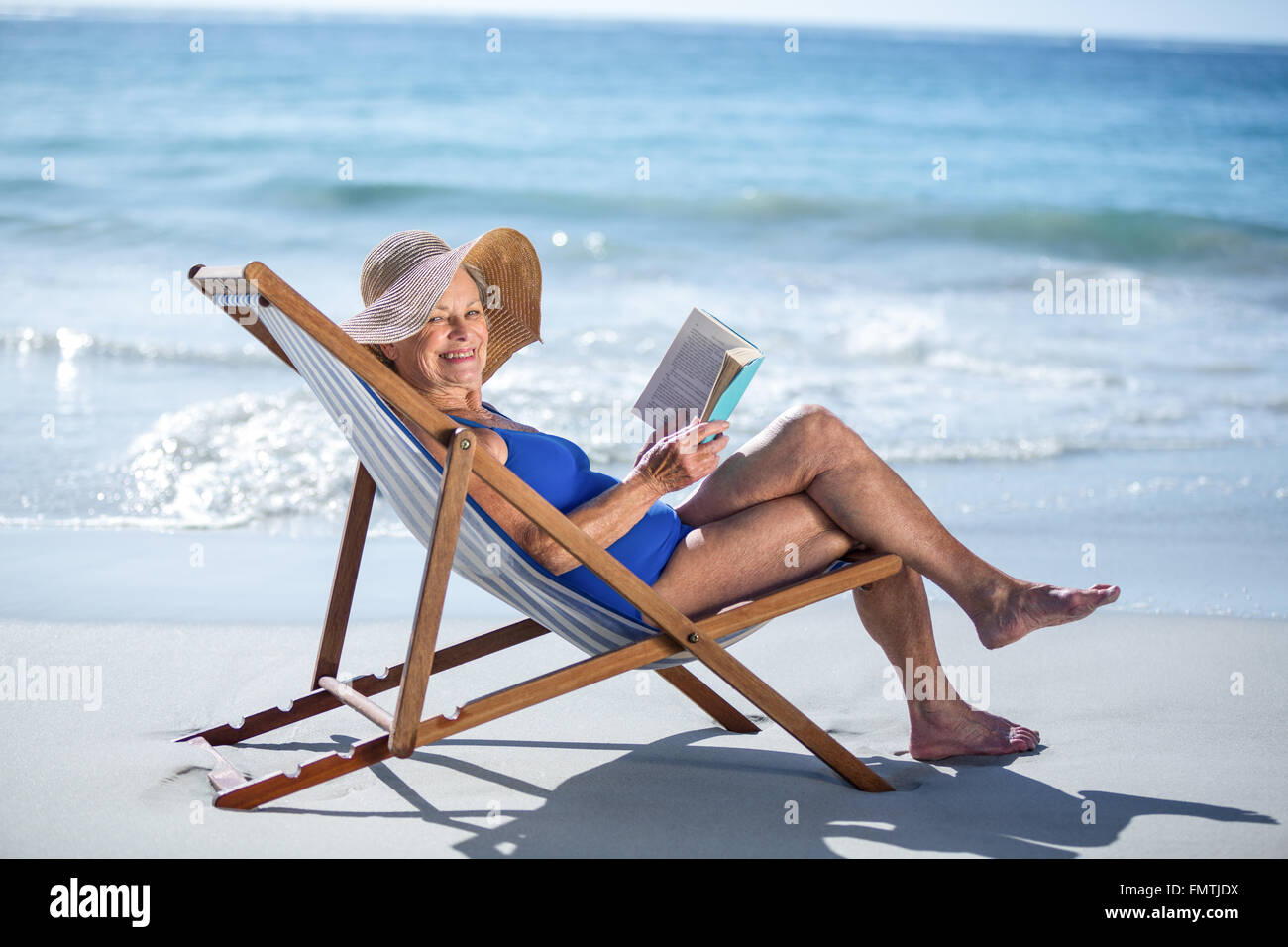 Woman Lying On Beach Chair High Resolution Stock Photography And Images Alamy