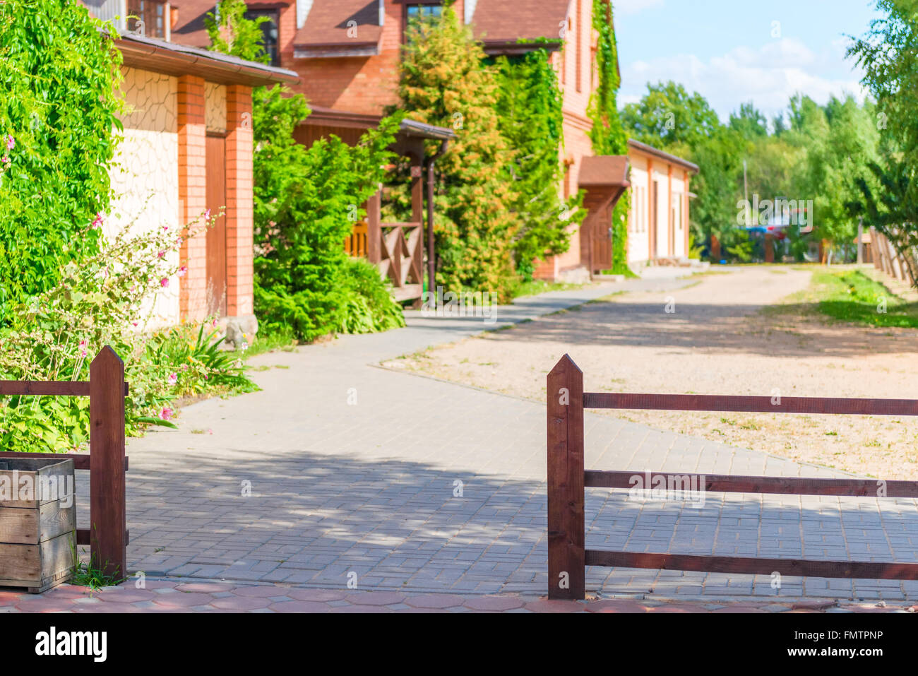 cozy courtyard houses on a summer day Stock Photo - Alamy
