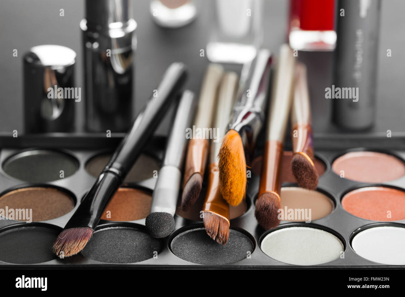 set of decorative cosmetics on a dark background Stock Photo