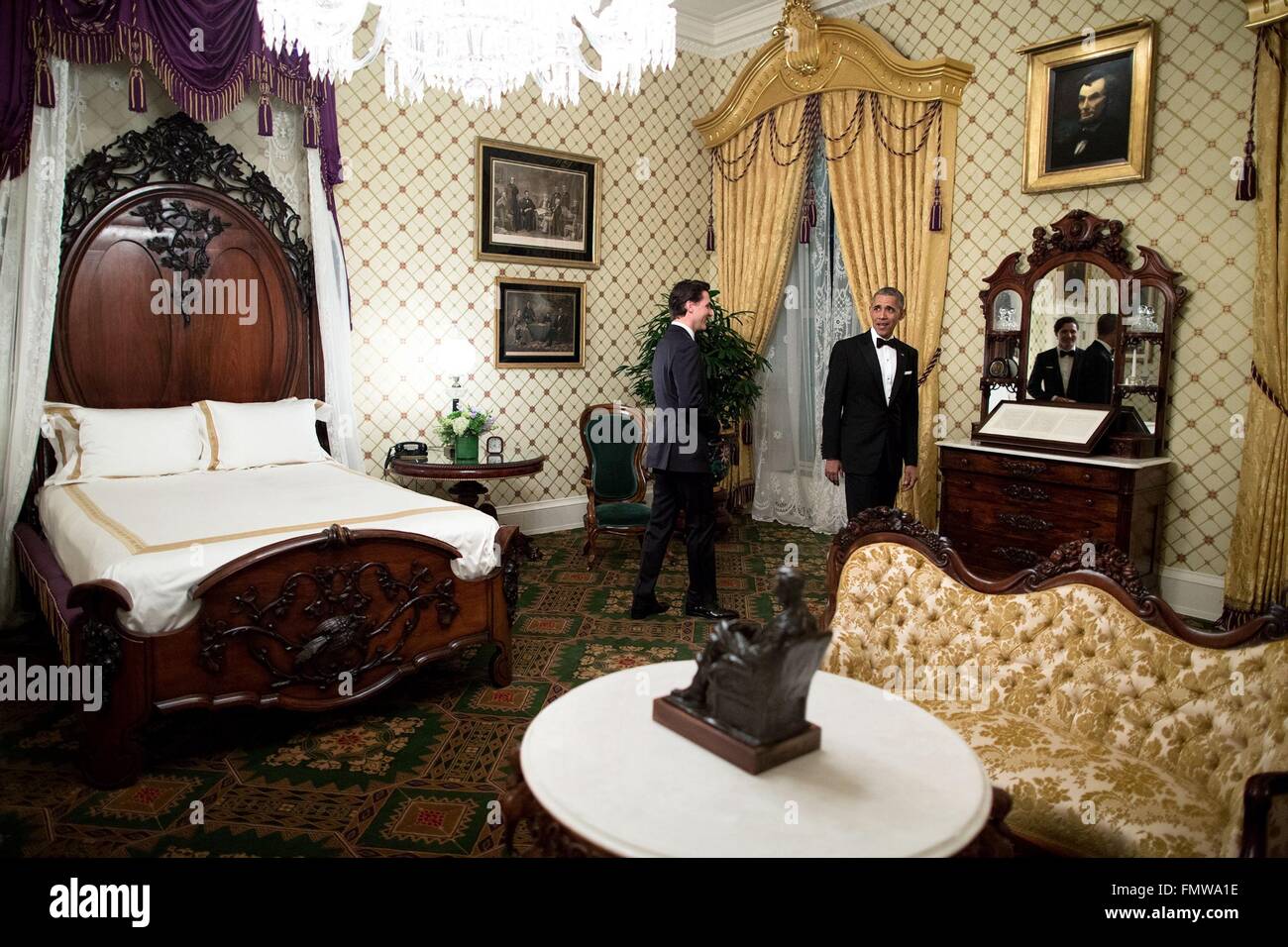 U.S. President Barack Obama shows Canadian Prime Minister Justin Trudeau the Lincoln Bedroom before the State Dinner at the White House March 10, 2016 in Washington, DC. This is the first state visit by a Canadian Prime Minister in 20-years. Stock Photo
