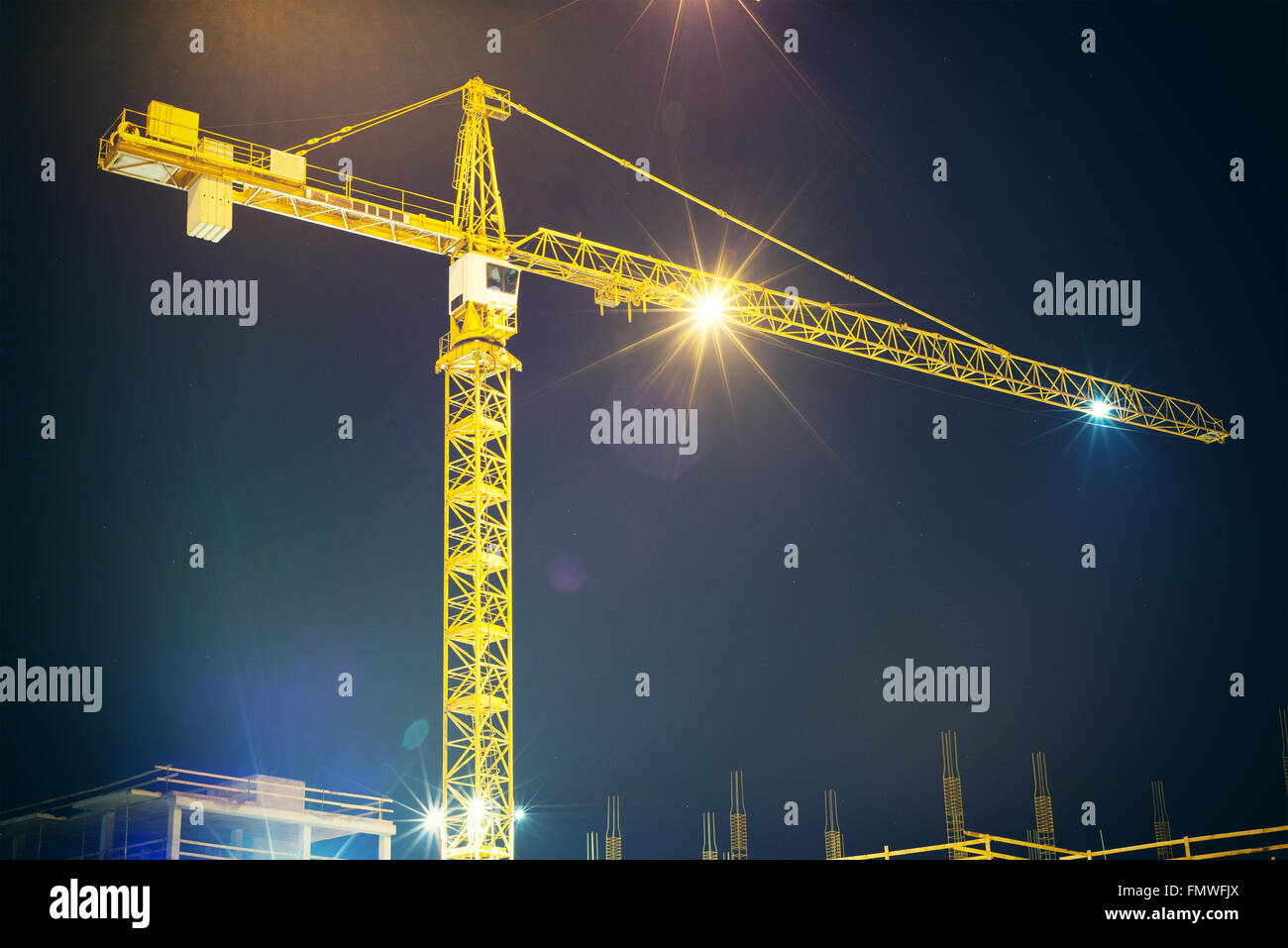 crane and illumination at night Stock Photo Alamy
