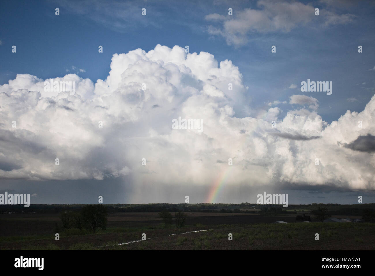 Vivid rainbow over Northcentral Missouri. Stock Photo