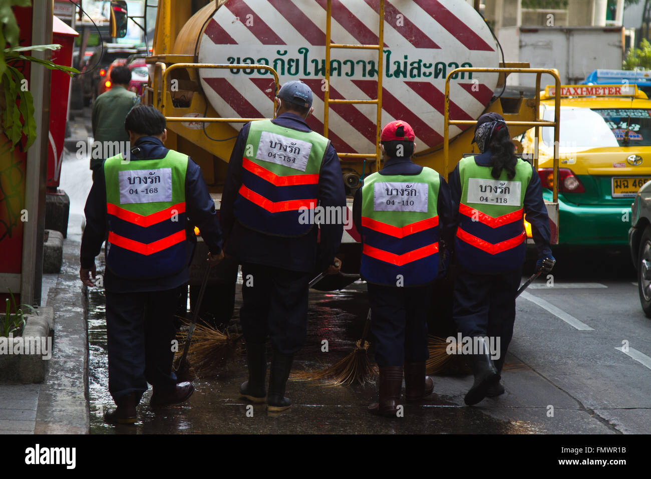 Men cleaning the streets in Bangkok Thailand Stock Photo Alamy