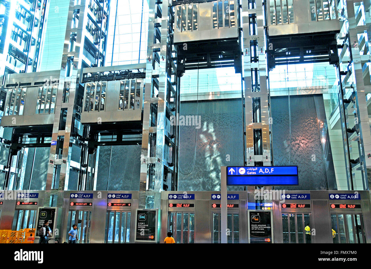 lifts in terminal of international airport Dubai UAE Stock Photo