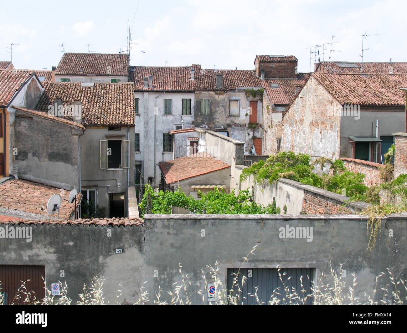 The rear view of houses in an Italian village Stock Photo - Alamy
