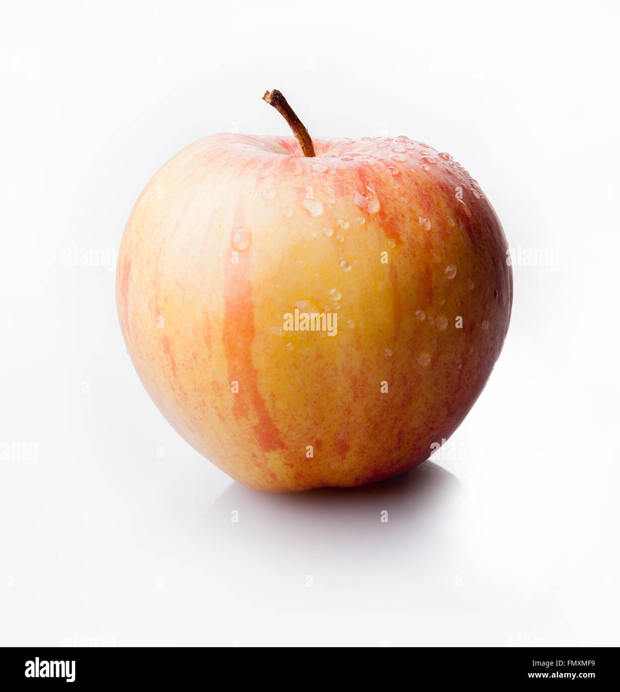 one yellow apple on isolated background Stock Photo - Alamy