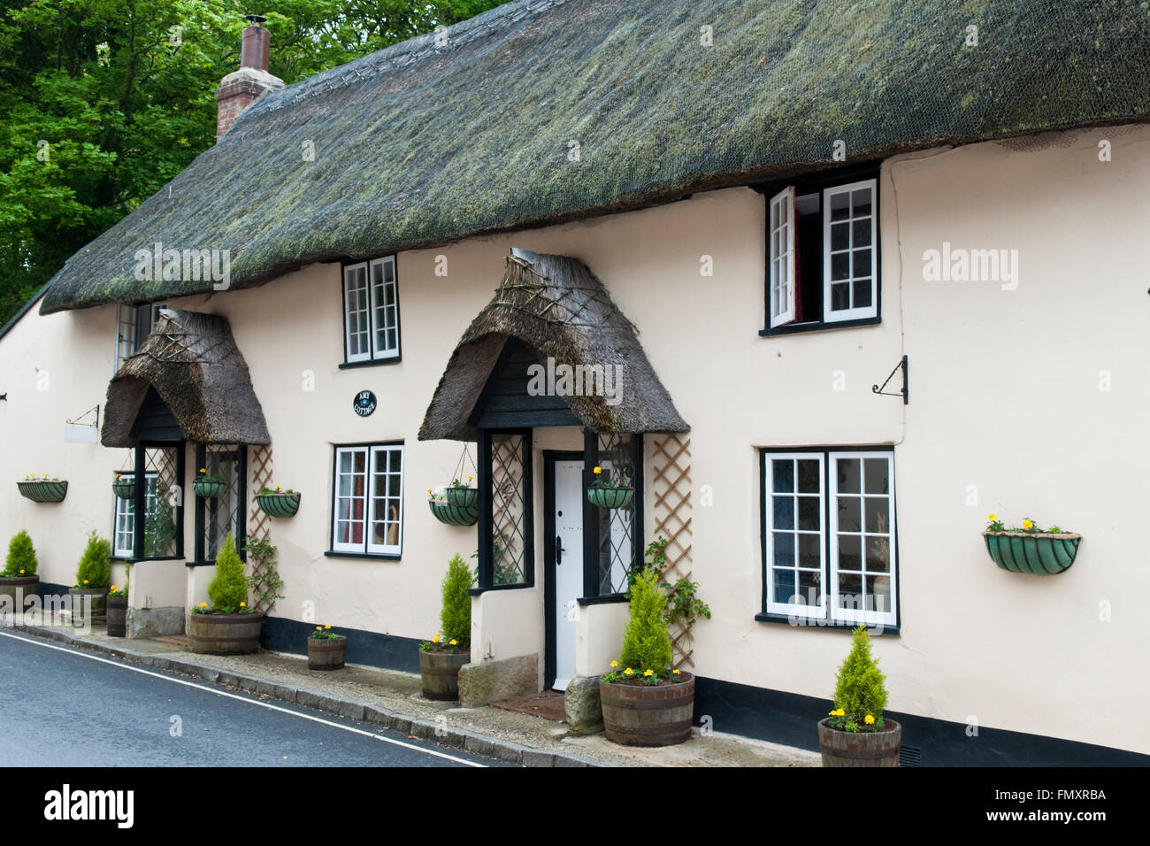 Traditional English thatched cottages in West Lulworth, Dorset, England Stock Photo