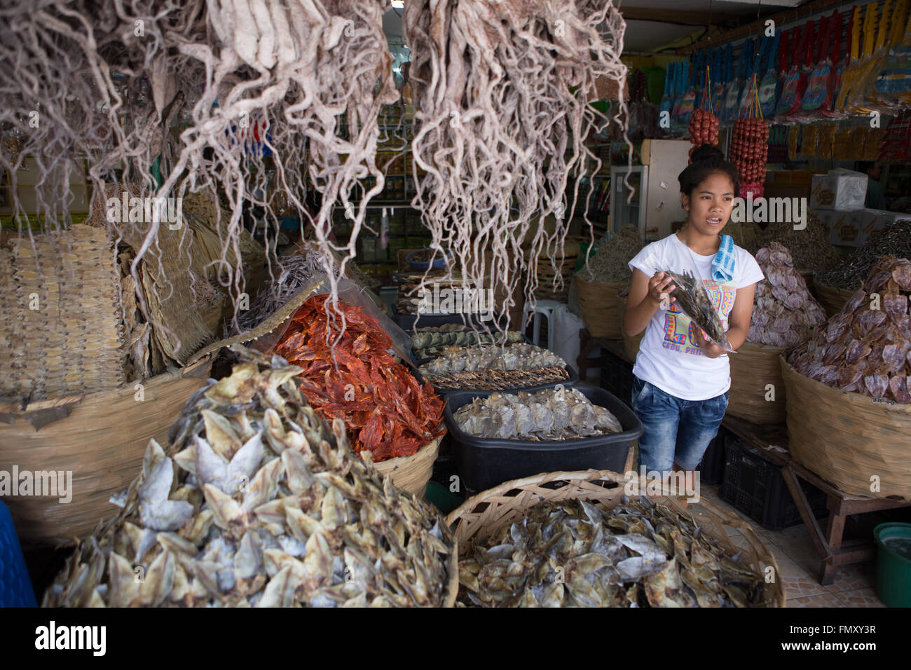 Dried fish is a particular delicacy in the Philippines. The image shows a vendors stall in Taboan Market,Cebu City. Stock Photo