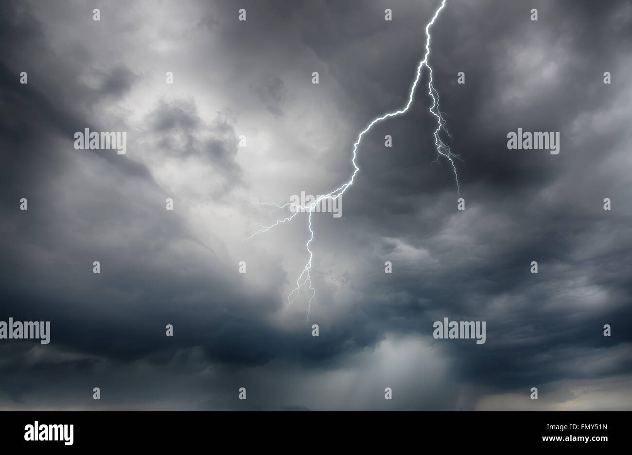 Lightning strike on the dark cloudy sky. HDR image Stock Photo - Alamy