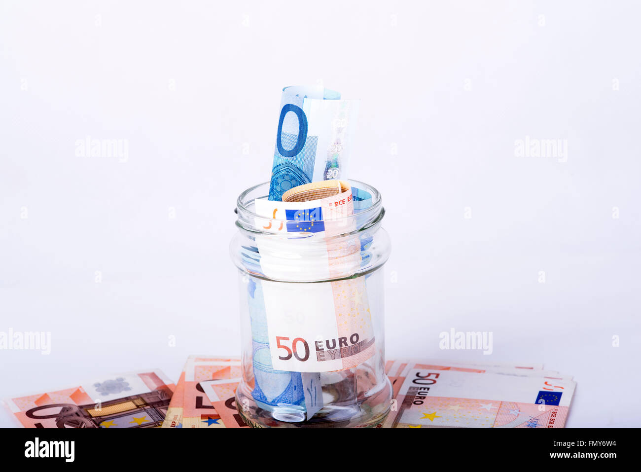 photo of euro savings hidden in a jar Stock Photo - Alamy