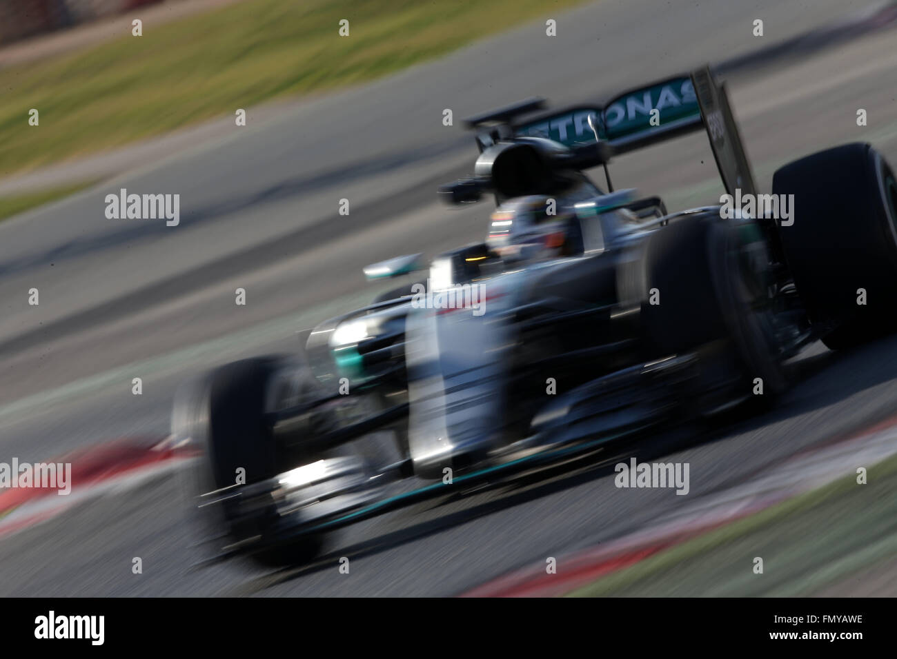 British Formula One driver Lewis Hamilton of Mercedes AMG steers his car during the training session for the upcoming Formula One season at the Circuit de Barcelona - Catalunya in Barcelona, Spain, 24 February 2016. Photo: Jens Buettner/dpa Stock Photo