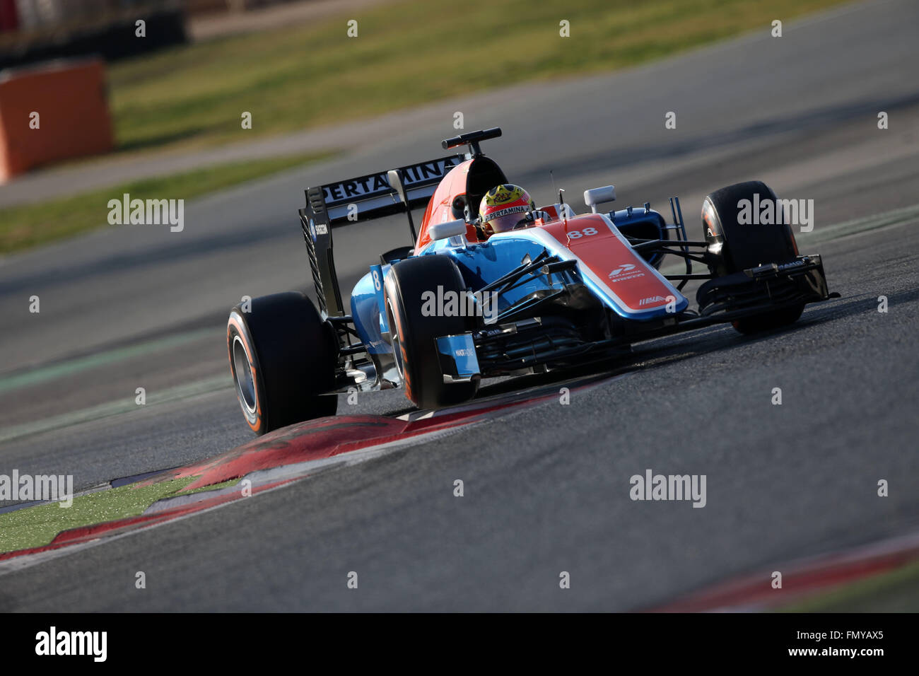 Indonesian Formula One driver Rio Haryanto of Manor Racing steers his car during the training session for the upcoming Formula One season at the Circuit de Barcelona - Catalunya in Barcelona, Spain, 24 February 2016. Photo: Jens Buettner/dpa Stock Photo