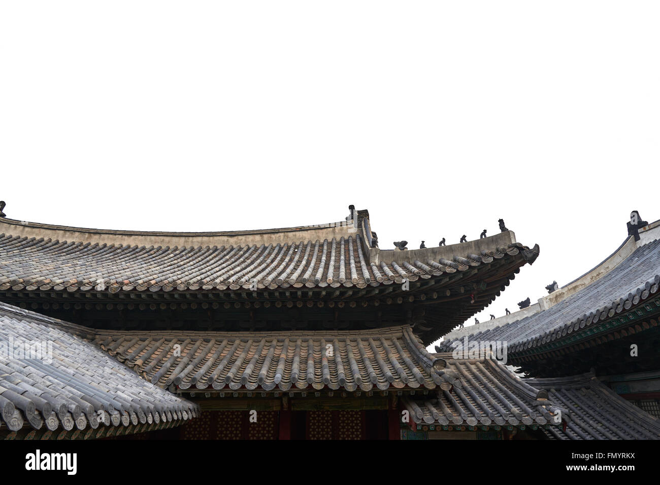 Korean traditional tiled roofs, isolated on white. Stock Photo