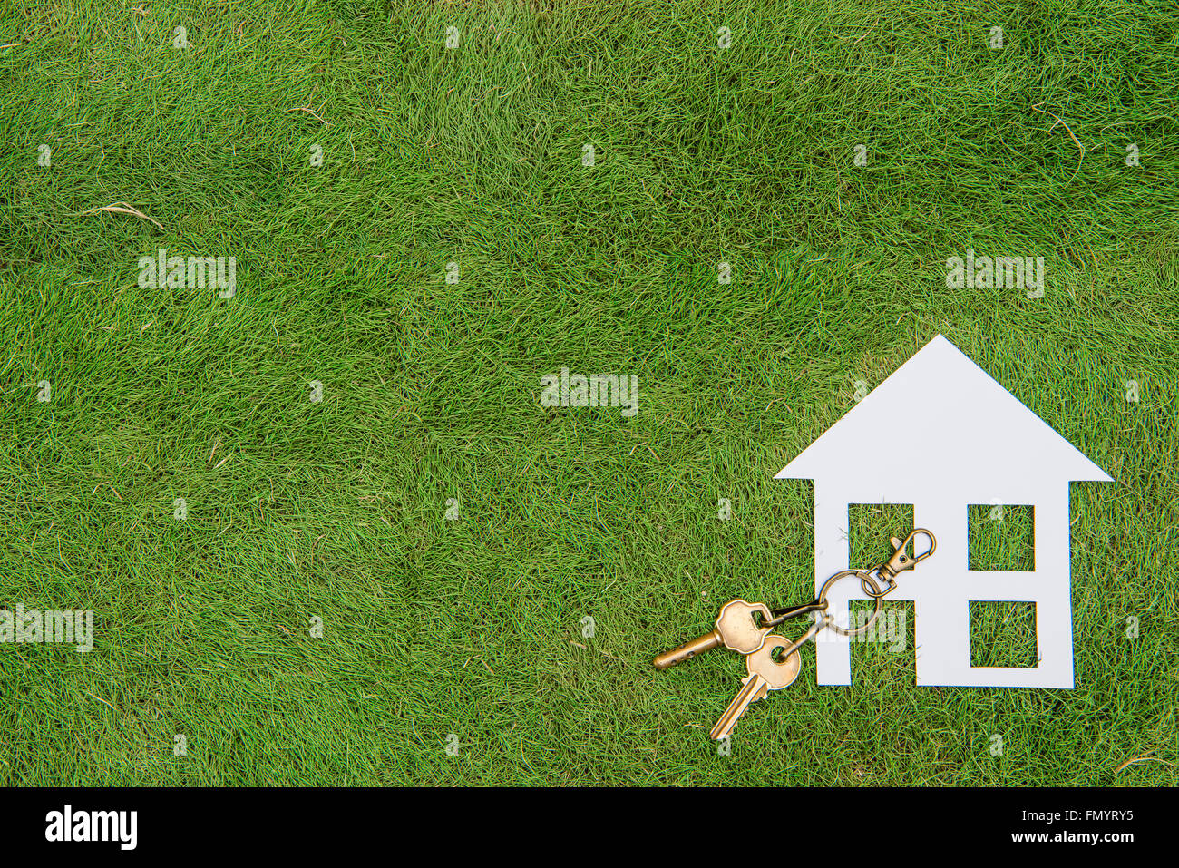 Paper house and key, home environment green living concepts Stock Photo