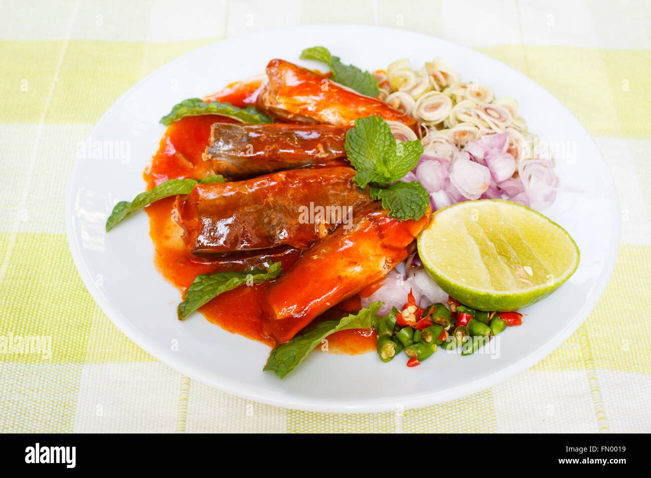 Spicy Sardines in tomato sauce canned fish,Yum thai food style Stock