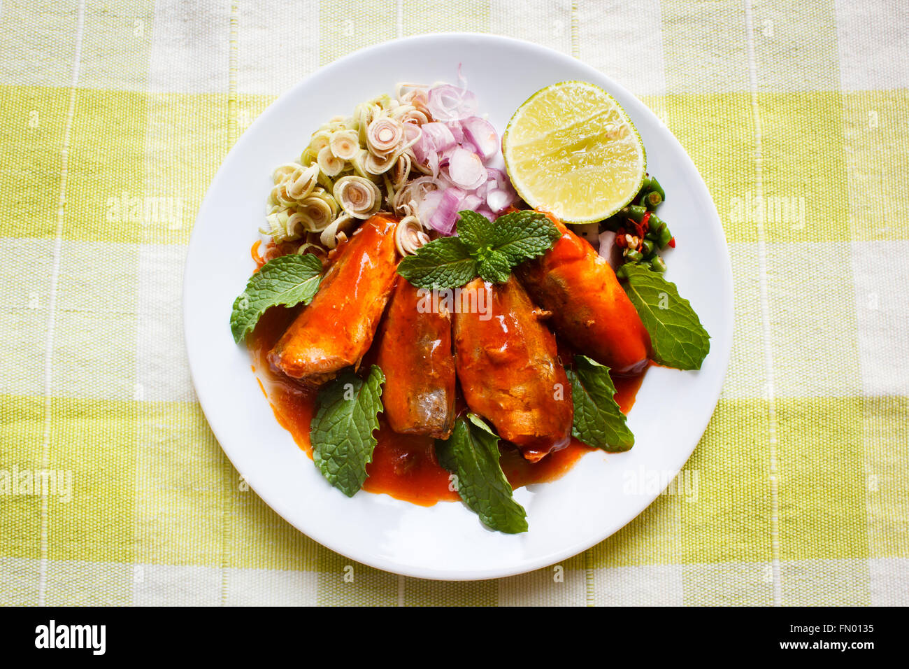 Spicy Sardines in tomato sauce canned fish,Yum thai food style Stock