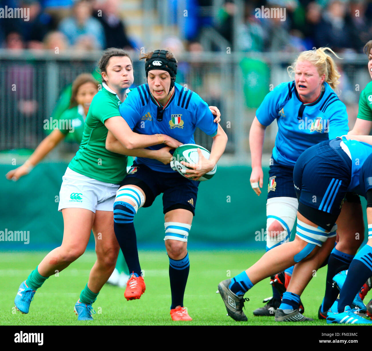 Donnybrook Stadium, Dublin, Ireland. 13th Mar, 2016. RBS Women's Six Nations Championships. Ireland versus Italy. Mary Healy (Ireland) tackles Elisa Giordano (Italy) at the back of the scrum. Credit:  Action Plus Sports/Alamy Live News Stock Photo